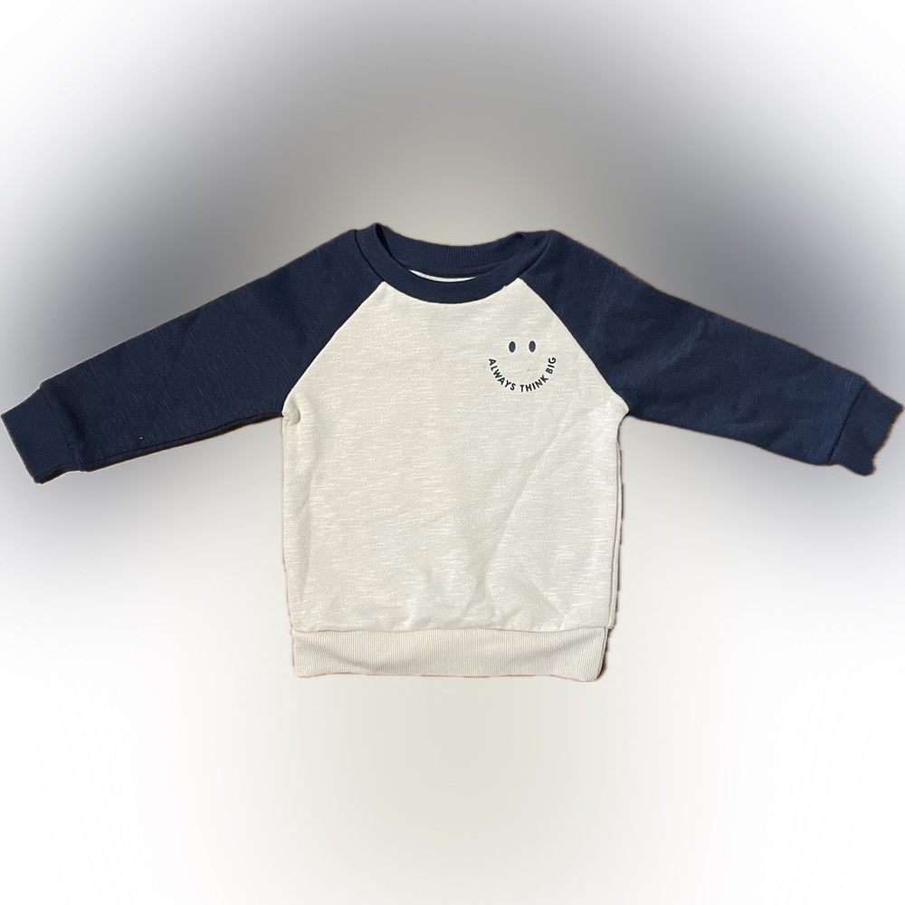 Cute Smiley Face Sweatshirt with Small Graphic on Front